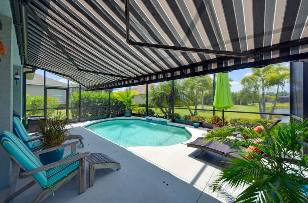 striped-outdoor-awning-over-pool-area